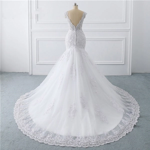 Elegant fishtail wedding dress with luxury lace embroidery and cathedral train
