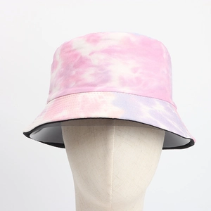 Detail view of pink and purple tie-dye bucket hat with cotton canvas texture and stitching