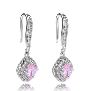 Detail of pink cushion-cut zircon halo drop earrings with silver hook fasteners