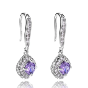 Detailed view of rectangle purple zircon earrings with halo stones and silver hooks