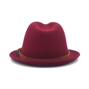 Elegant wine red wool felt fedora hat with a brown leather decorative belt and buckle