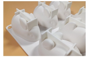 Detail of white silicone rabbit mold base with cross reinforcement and hanging hole