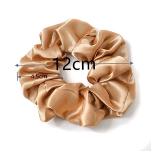 Detail showing 12cm champagne gold satin scrunchie with dimensions and silk texture