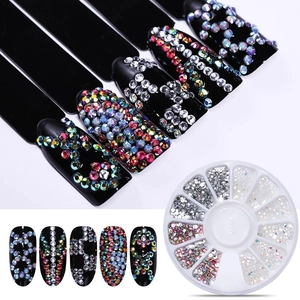 Macro view of crystal rhinestones in a storage box with elegant finished nail art designs