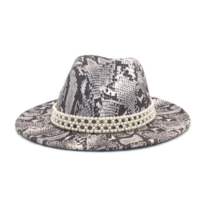 Detail of wool fedora hat with snake print pattern and triple-layer faux pearl trim