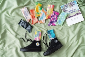 Close-up of colorful tie-dye cotton crew socks for men and women in street style fashion
