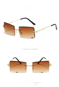 Detail view of gold frame rectangle sunglasses with gradient brown lenses from two angles
