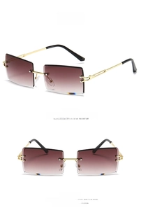 Detail of gradient brown rimless sunglasses with gold metal temples and diamond cut edges