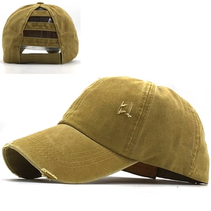 Detail of washed cotton ponytail baseball cap with three rear slits and distressed edges
