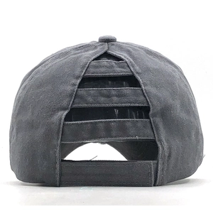 Detail of grey ponytail baseball cap featuring elastic cross bands and velcro closure