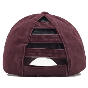 Detail of dark burgundy washed cotton ponytail baseball cap with criss-cross back straps