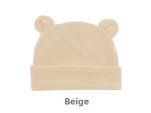 Detailed close-up of the beige knit baby beanie featuring cute round 3D Mickey ears