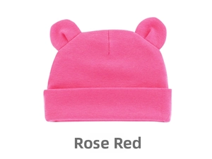 Detail of rose red baby beanie with cute mickey ears and soft cotton knit texture
