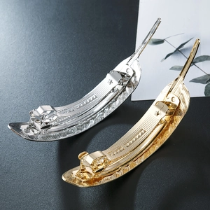 Elegant gold and silver metal feather hair clips with spring design for women