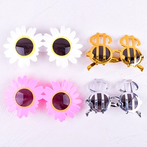Funny party sunglasses set including colorful daisies and metallic dollar sign shapes