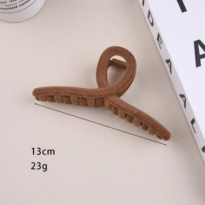 Detail of 13cm brown velvet shark hair claw clip showing dimensions and plush texture