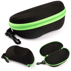 Close-up of black EVA sunglasses case with neon green zipper and interior storage space
