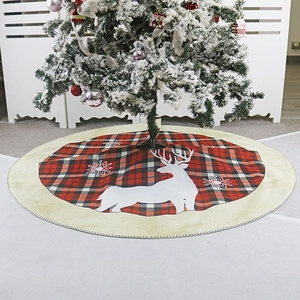 Classic red and black plaid Christmas tree skirt with reindeer and snowflake patterns