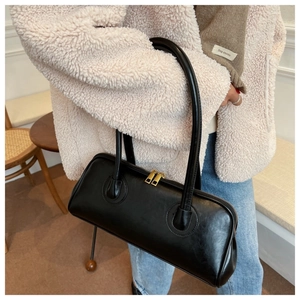 Classic black PU leather Boston handbag with gold double zippers and long top handles