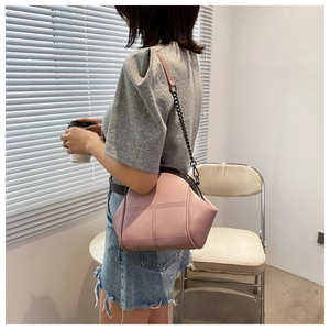 Pink shell chain bag with vintage kiss-lock closure and quilted PU leather texture