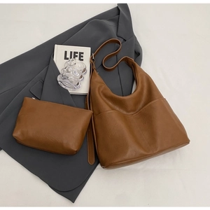 Brown vintage faux leather hobo bag with adjustable strap and matching small pouch