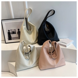 Litchi pattern leather tote bags displayed in four colors for daily commute and fashion