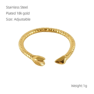 Macro shot of 18k gold plated stainless steel snake ring with adjustable opening detail