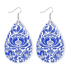 Blue and white porcelain floral pattern teardrop earrings on a white background