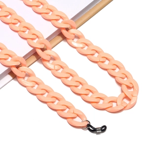 Macro shot of apricot acrylic eyeglass chain with large links and rubber non-slip loops