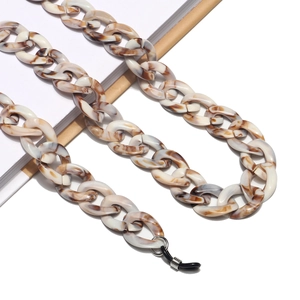 Detailed macro view of the marble texture acrylic chain links with silicone loops