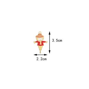 Detailed size view of a cartoon scarecrow alloy pendant measuring 3.5cm by 2.2cm