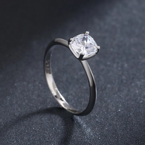 S925 sterling silver ring featuring a cushion-cut 5A cubic zirconia on a gray background