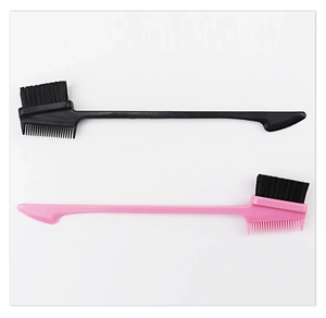 Detailed view of dual-ended eyebrow brushes with black and pink handles and nylon bristles