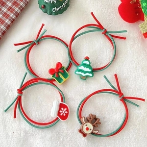 Christmas hair ties set with reindeer, tree, and gift charms on red green elastic cords
