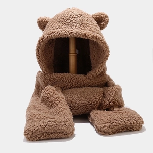 Detailed texture of thick brown plush bear ear hood with lamb wool finish