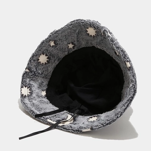 Plush grey bucket hat with white stars, featuring black lining and adjustable drawstrings