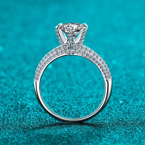 Elegant S925 sterling silver moissanite ring with six-claw setting and diamond accents