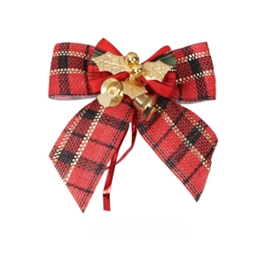 Detail showing red plaid faux burlap Christmas bow with gold leaf and bell accents