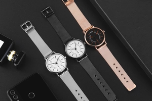 Detailed close-up of fashion men's quartz watches with stainless steel mesh straps