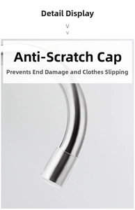 Detail of S-shaped pants hanger with anti-slip protective caps on silver metal ends