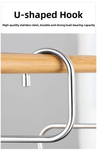 Detailed view of U-shaped stainless steel hook on a wooden rod with smooth metallic finish