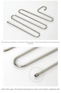 Detail of S-shaped stainless steel pants hanger featuring rounded corners and anti-slip caps