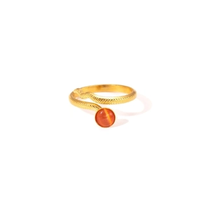 Golden snake-shaped open ring with textured band and orange cat-eye gemstone accent