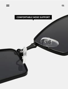 Detail shot of soft silicone nose pads and matte black frame of fan-shaped sunglasses