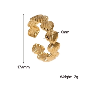 Detailed view of golden shell ring showing dimensions 17.4mm height and 6mm width