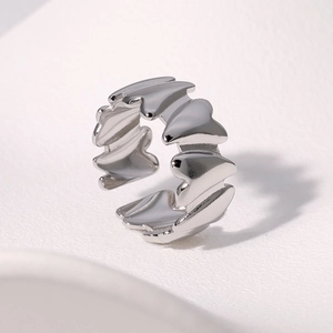 Elegant silver stainless steel ring with stacked heart wave patterns and adjustable opening