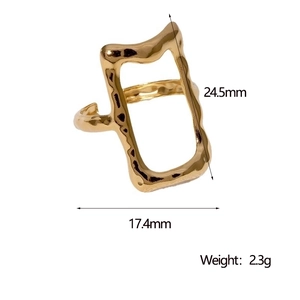 Detail shot of vintage hollow rectangular gold ring with 17.4mm width and wavy texture