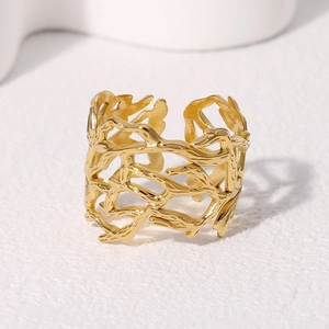 Minimalist irregular hollow wide branch ring in polished gold finish for women