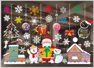 Detailed view of Christmas window stickers featuring Santa, snowman and snowflakes
