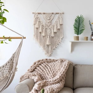 Minimalist handwoven bohemian macrame wall hanging in cream cotton for home decor
